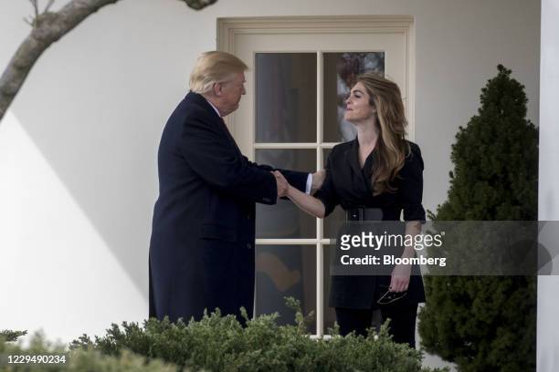 Bloomberg Best Of U.S. President Donald Trump 2017 U.S. President Donald Trump shakes hands with Hope Hicks, outgoing White House communications...