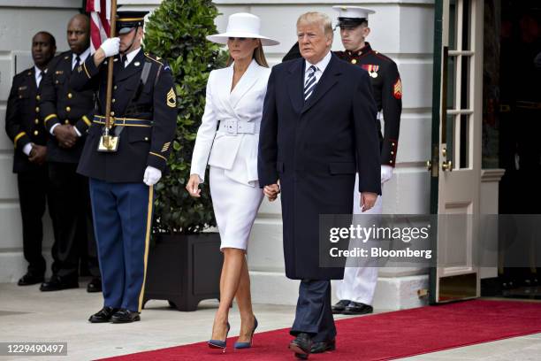 Bloomberg Best Of U.S. President Donald Trump 2017 U.S. President Donald Trump, right, and U.S. First Lady Melania Trump walk out of the White House...