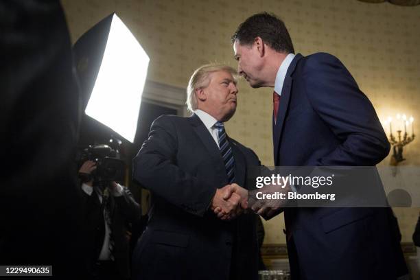 Bloomberg Best Of U.S. President Donald Trump 2017 U.S. President Donald Trump, left, shakes hands with James Comey, director of the Federal Bureau...