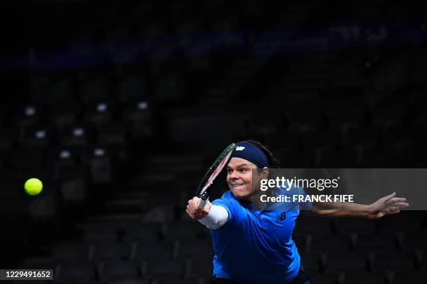 Canada's Milos Raonic returns the ball to France's Ugo Humbert during their men's singles quarter-final tennis match on day 5 at the ATP World Tour...