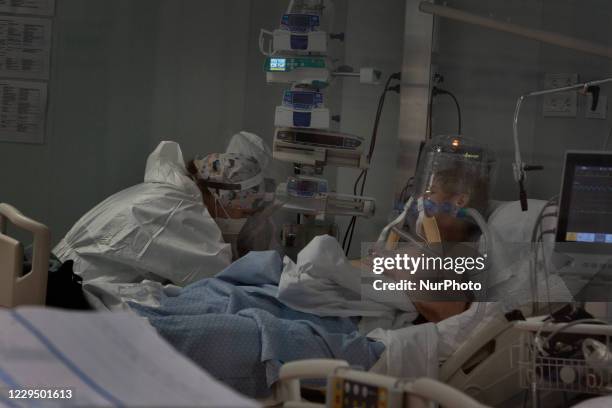 Nurses check a patient inside the intensive care unit in the COVID 19 department at the Istituto Clinico Casalpalocco hospital in Rome, Italy on 6th...