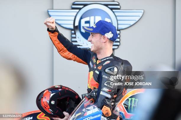 Red Bull KTM Factory Racing's Spanish rider Pol Espargaro celebrates getting the pole after winning the qualifying session of the MotoGP race of the...