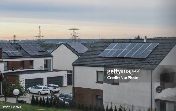 Solar panels mounted on the residential house roof to generate own electricity and lower the electricity bills are seen in Gdansk, Poland on 12...