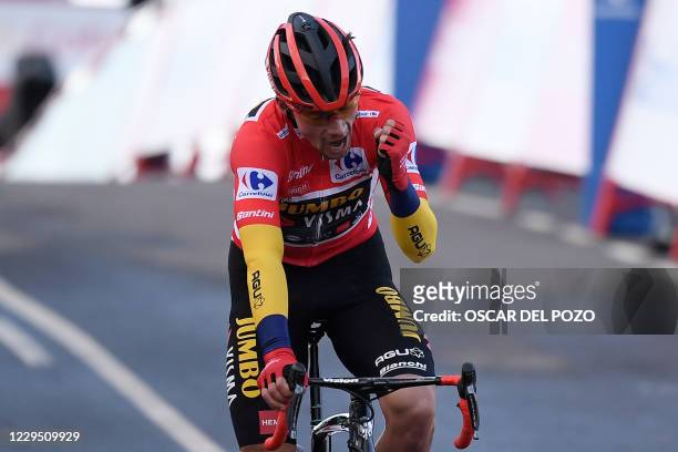 Team Jumbo's Slovenian rider Primoz Roglic reacts at the end of the 17th stage of the 2020 La Vuelta cycling tour of Spain, a 178,2-km race from...