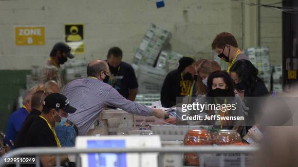 Allegheny County election employees organize ballots at the Allegheny County elections warehouse on November 7, 2020 in Pittsburgh, Pennsylvania....