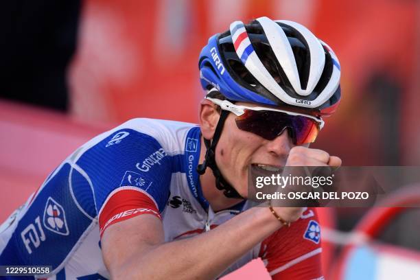 Team Groupama-FDJ's French rider David Gaudu celebrates as he crosses the finish-line of the 17th stage of the 2020 La Vuelta cycling tour of Spain,...