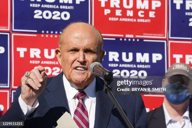 Attorney for the President, Rudy Giuliani, speaks at a news conference in the parking lot of a landscaping company on November 7, 2020 in...