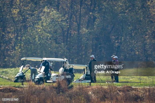 President Donald Trump golfs at Trump National Golf Club, on November 7, 2020 in Sterling, Virginia. News outlets projected that Democratic nominee...