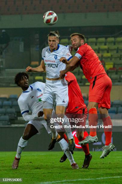 Noah Loosli of FC Lausanne-Sport battles for the ball with Mijat Maric of FC Lugano during the Super League game between FC Lausanne-Sport and FC...