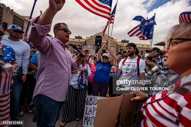 Supporters of US President Donald Trump demonstrate in front of the Arizona State Capitol in Phoenix, Arizona, on November 7, 2020. - Democrat Joe...