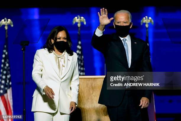 President-elect Joe Biden and Vice President-elect Kamala Harris arrive to deliver remarks in Wilmington, Delaware, on November 7 after being...
