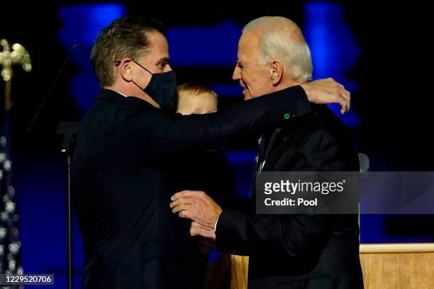 President-elect Joe Biden embraces his son Hunter Biden after addressing the nation from the Chase Center November 07, 2020 in Wilmington, Delaware....