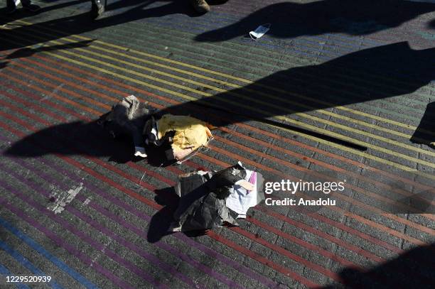 Torn up and beaten piÃ±ata of Donald Trump is seen at the historic rainbow intersection of Castro and the 18th streets after news agencies called the...