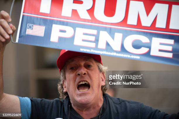 Donald Trump supporters gather in front of the Pennsylvania Convention Center, claiming that Biden and the Democrats were stealing the election,...