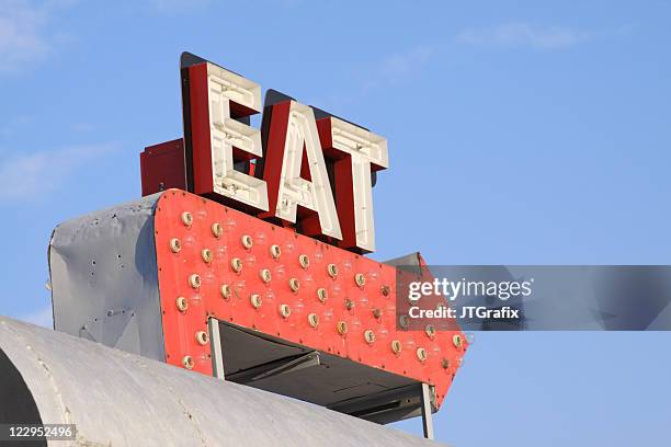 retro restaurant sign that says eat on red arrow - 50s diner stock pictures, royalty-free photos & images