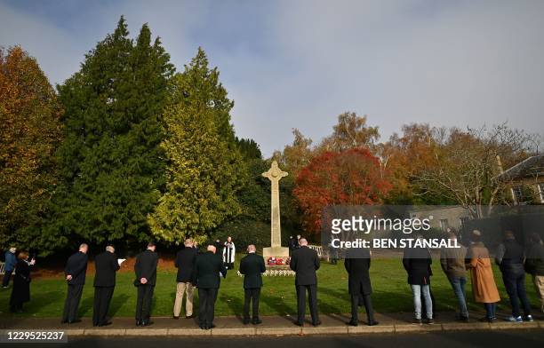 The Vicar of Brenchley Reverend Campbell Paget conducts a socially distanced Remembrance Sunday service at the War Memorial in Brenchley, south east...