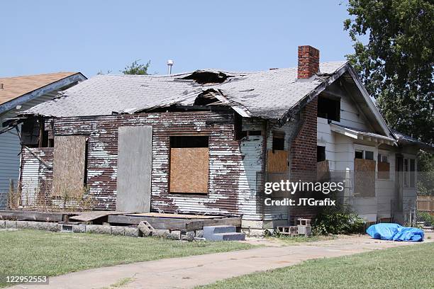 abandoned and condemned house - boarded up stock pictures, royalty-free photos & images