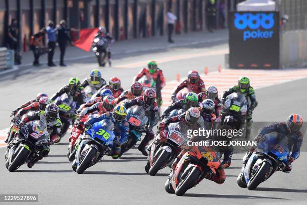 Red Bull KTM Factory Racing's Spanish rider Pol Espargaro leads at the start of the MotoGP race of the European Grand Prix at the Ricardo Tormo...