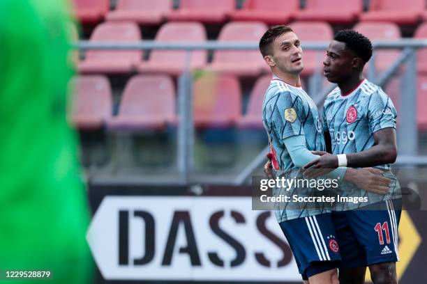 Quincy Promes of Ajax celebrates 3-0 with Dusan Tadic of Ajax during the Dutch Eredivisie match between FC Utrecht v Ajax at the Stadium Galgenwaard...