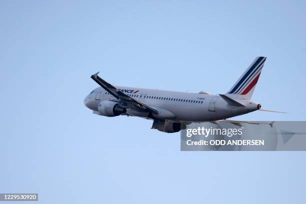 An aircraft of French airline Air France, the last plane to take off from Tegel 'Otto Lilienthal' Airport, flies after its departure to Paris-Charles...