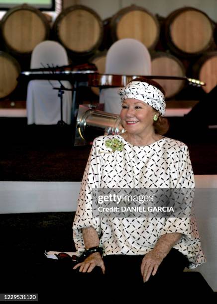 Baroness Nadine de Rothschild listens to French businessman Laurent Dassault during the inauguration of the Flechas de los Andes winery 10 March,...