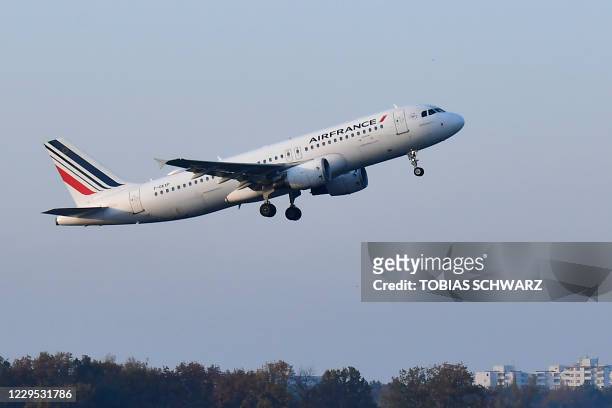 An aircraft of French airline Air France, the last plane to take off from Tegel 'Otto Lilienthal' Airport, departs for Paris-Charles de Gaulle...