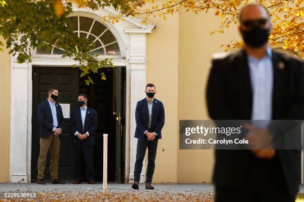 Security keeps watch as President-elect Joe Biden attends church inside St. Joseph on the Brandywine Roman Catholic Church in Wilmington, Delaware on...