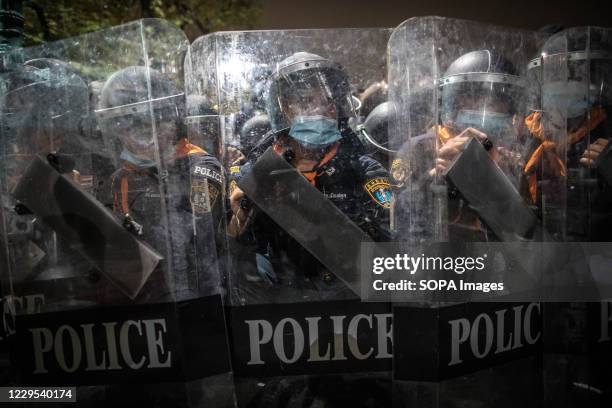 Police Using Riot Shields Riot police officers seen behind their shields during an... News Photo ...