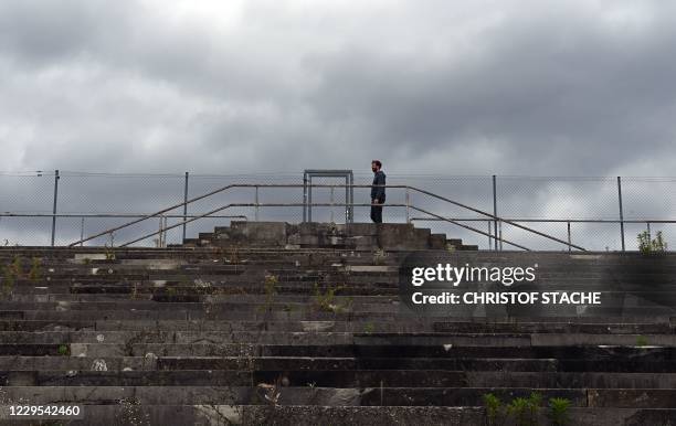 Visitor walks on the stairs of the Zeppelinfeld of the Reichsparteitagsgelaende in Nuremberg, southern Germany, on September 24, 2020. - When Nazi...