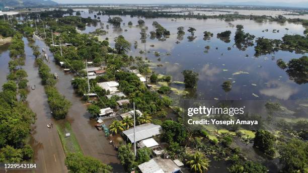 Community road leading to Puerto Cortes is seen after it was flooded by tropical storm Eta on November 8, 2020 in Rio Nance, Honduras. Eta entered...