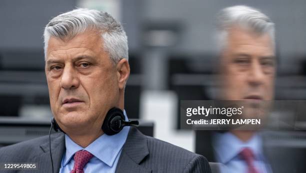 Kosovar former president Hashim Thaci sits for the first time before a war crimes court in The Hague on November 9 to face charges relating to the...