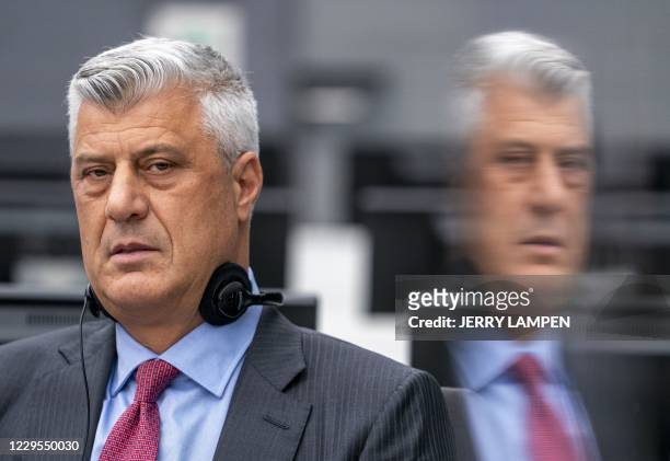 Kosovar former president Hashim Thaci sits for the first time before a war crimes court in The Hague on November 9 to face charges relating to the...