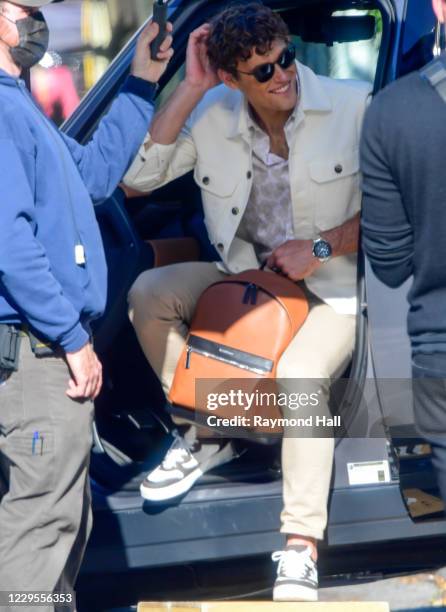 Model Simon Nessman is seen on the set of a photo for Michael Kors in SoHo on November 9, 2020 in New York City.