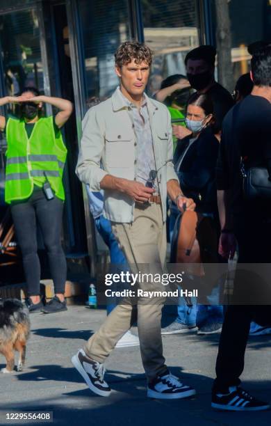 Model Simon Nessman is seen on the set of a photo for Michael Kors in SoHo on November 9, 2020 in New York City.