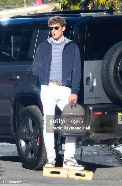 Model Simon Nessman is seen on the set of a photo for Michael Kors in SoHo on November 9, 2020 in New York City.