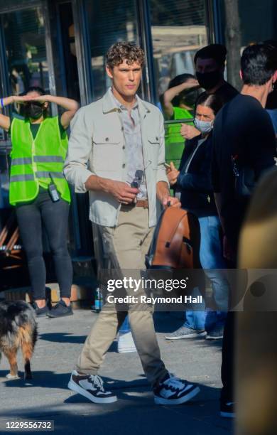 Model Simon Nessman is seen on the set of a photo for Michael Kors in SoHo on November 9, 2020 in New York City.