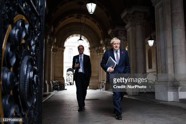 British Prime Minister Boris Johnson, Conservative Party leader and MP for Uxbridge and South Ruislip, and his Principal Private Secretary Martin...