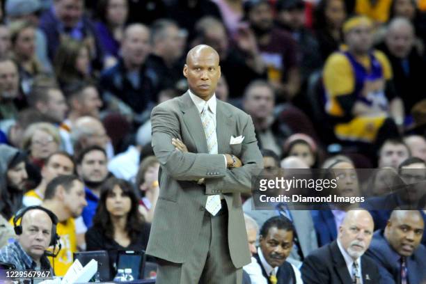 Head coach Byron Scott of the Los Angeles Lakers looks on in the first half of a game against the Cleveland Cavaliers at Quicken Loans Arena on...
