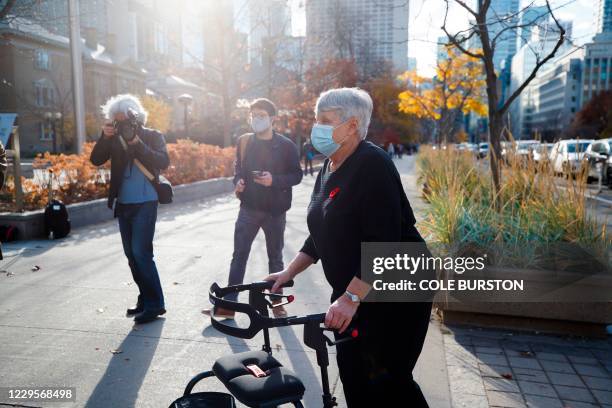 Van attack victim Cathy Riddell arrives to the Superior Court of Justice in Toronto, Ontario, Canada on November 10 during the first day of the trial...