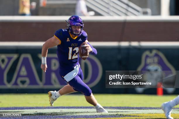 East Carolina Pirates Quarterback Holton Ahlers runs with the ball during the first half of the College Football game between the Tulane Green Wave...