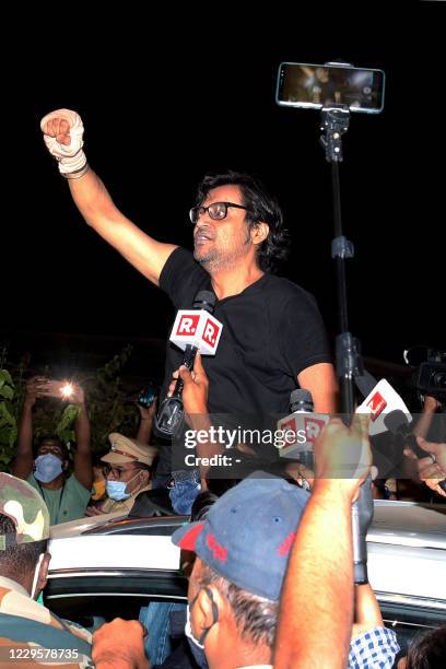 Indian Journalist and editor-in-chief of Republic TV Arnab Goswami gestures after his release from prison on granted interim bail by the country's...