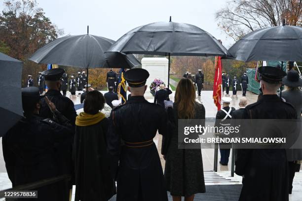 President Donald Trump salutes as he attends a "National Day of Observance" wreath laying ceremony on November 11, 2020 at Arlington National...