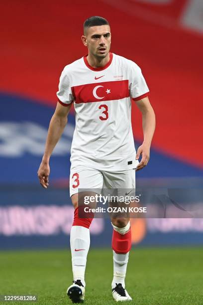 Turkey's defender Merih Demiral walks on the pitch during the friendly football match between Turkey and Croatia at the Vodafone Park in Istanbul on...