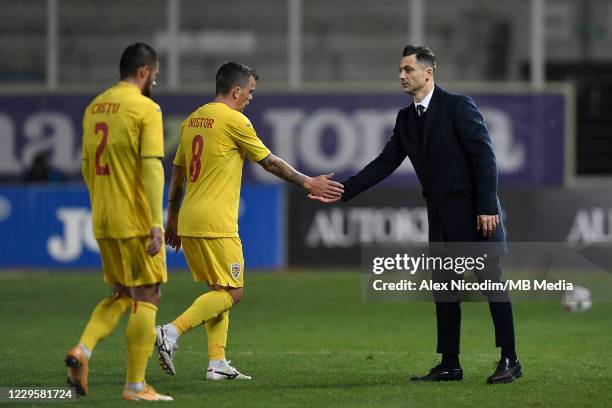 Mirel Radoi head coach of Romania and dan Nistor react during the international friendly match between Romania and Belarus at Ilie Oana stadium on...