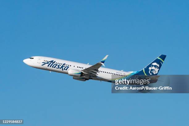 Alaska Airlines Boeing 737-990 takes off from Los Angeles international Airport on November 11, 2020 in Los Angeles, California.