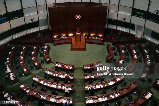 Empty seats are seen during a session at the Legislative Council outside of the main chamber on November 12, 2020 in Hong Kong, China. Nineteen...