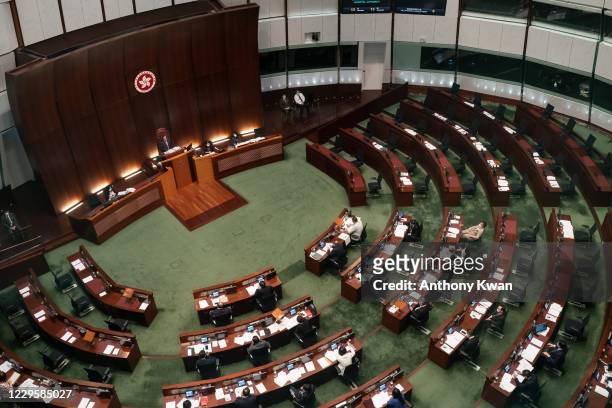 Empty seats are seen during a session at the Legislative Council outside of the main chamber on November 12, 2020 in Hong Kong, China. Nineteen...