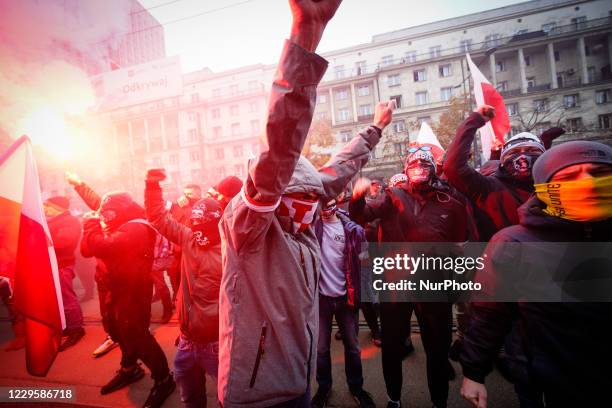 Participants, mainly nationalists and hard core football fans of the Independence Day march are seen at the start of the march in Warsaw, Poland on...