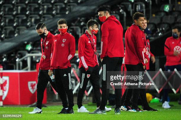 Harry Wilson, Daniel James and Kieffer Moore of Wales check out the pitch prior to the international friendly match between Wales and USA at the...