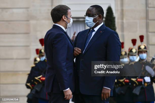 The President of the French Republic, Emmanuel Macron receives Mr. Macky Sall , President of the Republic of Senegal for a working meeting at the...